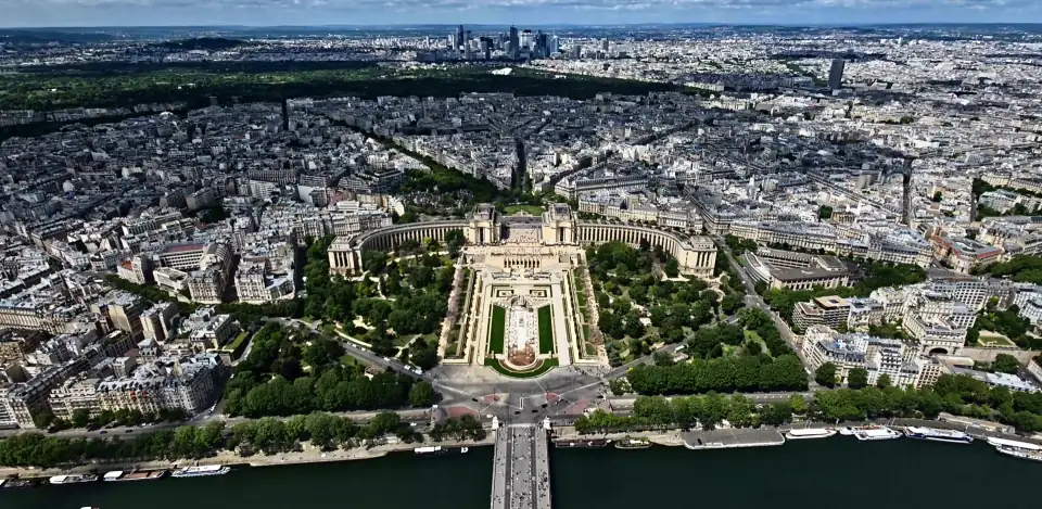 Aerial view of Paris from above the Seine, looking over the Trocadero towards La Defense.